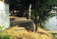 Village Builders stonework view of lake